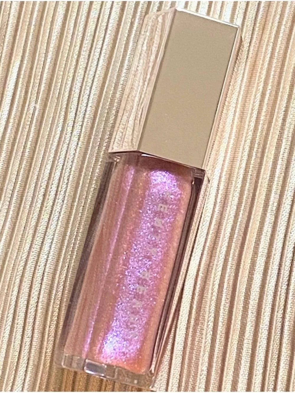 Fenty Beauty Gloss Bomb in Grape Splash